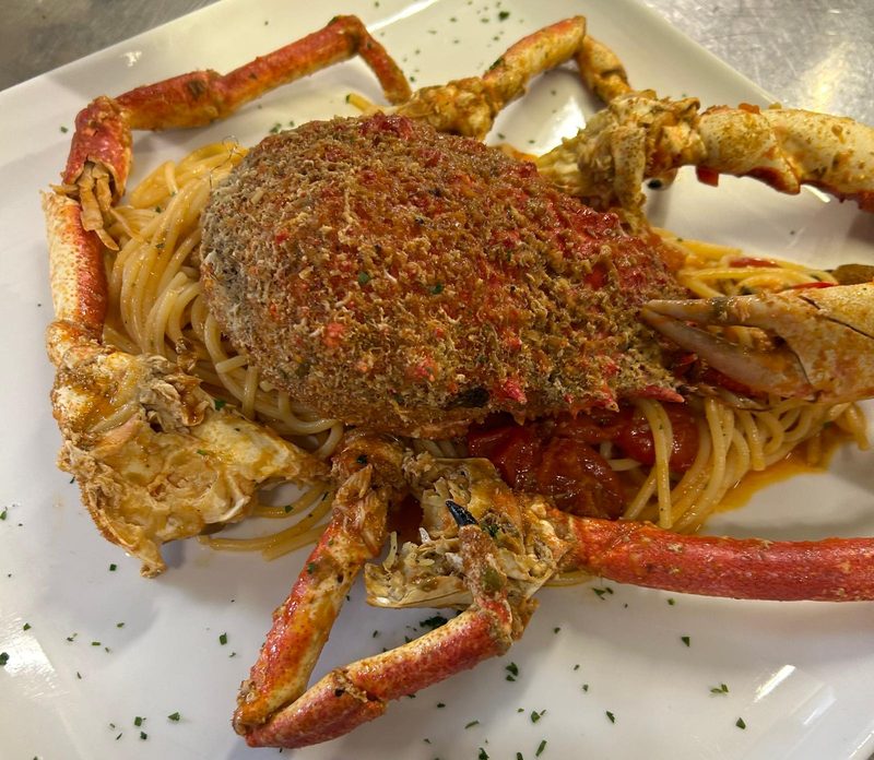 Spaghetti con granseola gratinata